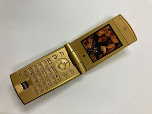 AE196 docomo FOMA F702iD 金色