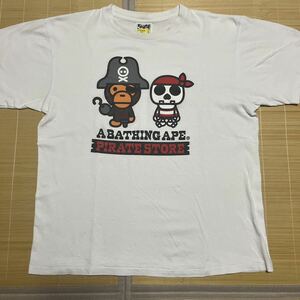 A BATHING APE BAPE KAWS PIRATE STORE パイレーツストア　tee tシャツ BABY MILO ベビーマイロ　L 白　ホワイト　SHARK スカルボーン