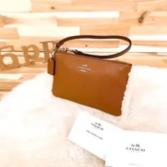 【コーチ】COACH 型押し レザー 革 ファー ドッキング ポーチ 茶×白