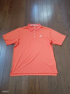 1321【中古】adidas golf アディダス ゴルフウェア　半袖　ポロシャツ　オレンジ　胸にロゴ有　全体に菱形の総柄　メンズ　サイズ　O/XG