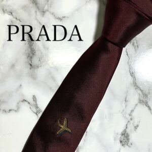 極美品　PRADA プラダ　ネクタイ　ナロータイ　刺繍　ソリッド　無地　ワインレッド　ボルドー　イタリア　シルク　光沢　ジャガード