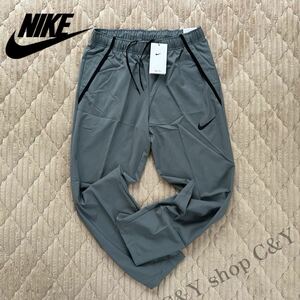 格安送料 Mサイズ 新品 NIKE ナイキ ウーブンパンツ ドライフィット トレーニング ランニング スポーツウェア グレー CU4958-084