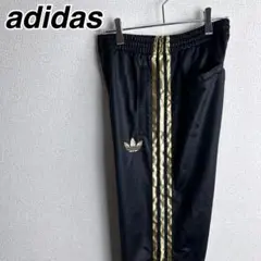 adidas アディダス 黒金 古着 トラックパンツ ジャージ