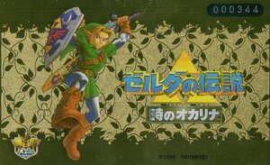 ★ゼルダの伝説時のオカリナ　任天堂　ファミ通一族の陰謀　ナンバー入り　金ピカ　傷有★テレカ５０度数未使用vw_17