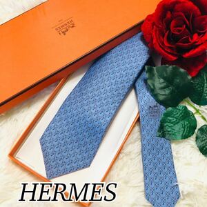 10 HERMES エルメス ネクタイ 男性 紳士 ブランドネクタイ 総柄 結婚式 ビジネス 水色 新品未使用