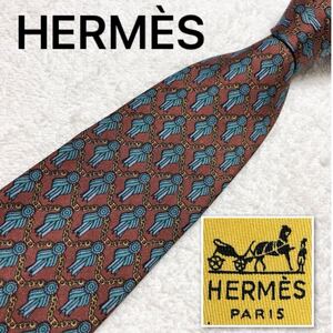 ■美品■HERMES エルメス　ネクタイ　チェーン　勲章リボン　総柄　シルク100% フランス製　ブラウン×ブルー　ビジネス