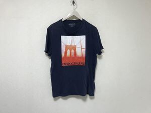 本物カルバンクラインジーンズCalvin Klein Jeansコットンフォトプリント半袖Tシャツメンズアメカジサーフミリタリーワーク青ブルーM