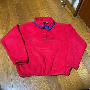 Patagoniaパタゴニアkids10サイズフリースシンチラスナップt軽量速乾定番子供プルオーバーフリースジャケット人気赤ポケット付き古着