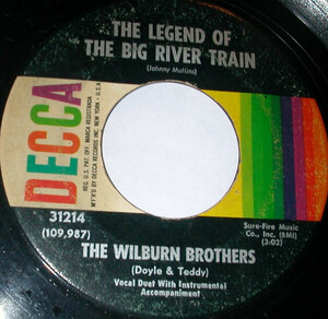 米7 The Wilburn Brothers The Legend Of The Big River Train / The Flames Still Burning 31214 Decca /00080