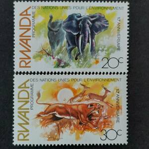 J411 ルワンダ切手「国連環境プログラム10周年記念切手2種(アフリカゾウ、ライオンとインパラ)セット」1986年発行　未使用