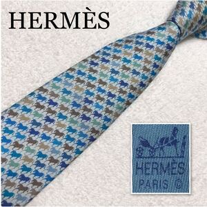 HERMES エルメス　ネクタイ　馬　ホース　総柄　シルク100% フランス製　ブルー系×ブラウン系　ビジネス