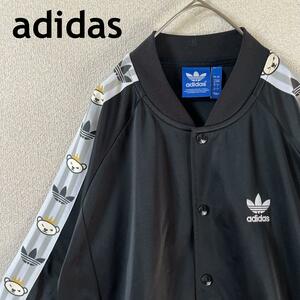 Q2 adidasスナップボタンジャージジャケットサイドラインキャラロゴXL