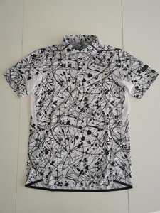 オークリー　ＳＫＵＬＬ　ＡＵＲＯＲＡ　ＣＡＬＬＩＧＲＡＰＨＩＣ　ＳＨＩＲＴＳ　ＦＯＡ４０2４８１　(ＷＨＩＴＥ ＰＲＩＮＴ)　ＸＸＬ