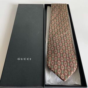 グッチ（GUCCI）緑ベルトダイヤ丸総柄ネクタイ