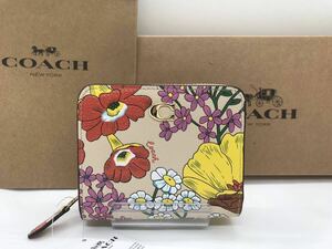 新品COACH 二つ折り財布　フローラルプリント