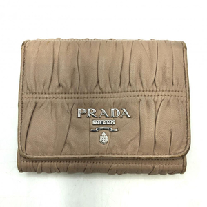 【中古】PRADA ナッパゴーフル 3つ折り財布 ピンク 使用感大 プラダ[240017644858]