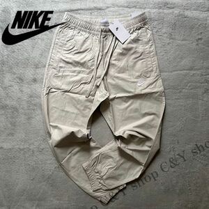 格安送料 Mサイズ 新品 NIKE ナイキ スポーツウェア カフパンツ トラックパンツ コットン ウーブン パンツ ナイロン ジョガー aDD5311-072