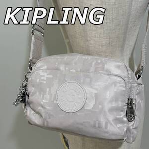 【KIPLING】キプリング ショルダーバッグ ナイロンボディ キャンバスストラップ 総柄 ロゴ ワッペン 斜め掛け かばん KPKI5819M291