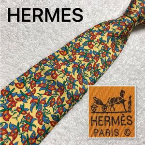 ■美品■HERMES エルメス　ネクタイ　チョウ　現代風デザイン　総柄　シルク100% フランス製　イエロー×マルチカラー　ビジネス