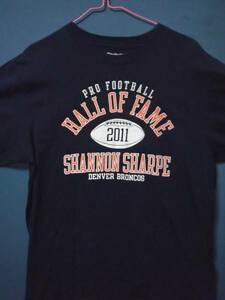 ④ USA古着 サイズL 前ロゴSHANNON SHARPE 紺色半袖Tシャツ