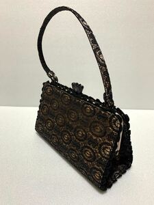 アナスイ　ANNA SUI レース黒・金色　ミニバッグ　ハンドバッグ　アクセサリーバッグ　美品　送料60サイズ