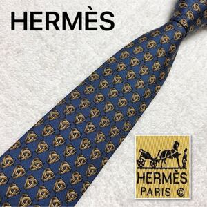 ■美品■HERMES エルメス　ネクタイ　総柄　刃　カマ　シルク100% フランス製　ブルー系　ビジネス