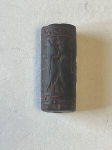 Cylinder seal Black steatite. Syria 2nd or 3rd mill.B.C. L.3.3cm. F