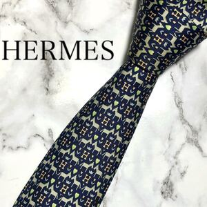 エルメス　HERMES ネクタイ　H柄　ハート　プリント　ファソネ　アニマル　動物　ネイビー　ブルー　青　紺　シルク　フランス　スーツ