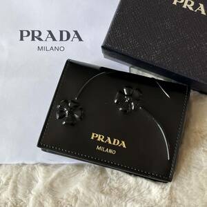 PRADA プラダ イタリア製 フラワーエンボス レザー二つ折り財布 黒 ブラック 1MV204 SPAZZOLATO FIOR NERO