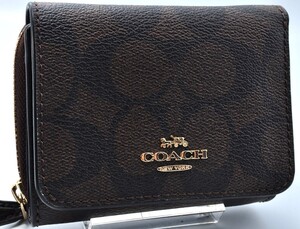 未使用 COACH コーチ シグネチャー 三つ折り財布 PVC レザー 革 ブラウン 茶色 総柄 柄あり ロゴ ジップ ファスナー レディース 2E12458