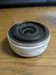 Nikon(ニコン）1 NIKKOR 10mm f/2.8 （ホワイト）中古美品です。