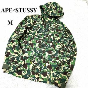 【美品】即完 A BATHING APE STUSSY マウンテンパーカー カモ 迷彩 カモフラ　M エイプ　ステューシー　コラボ　限定　ナイロンジャケット