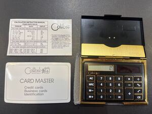 電卓 計算機　コリブリ　Colibri カードマスター　CARD MASTER 記念品　色石　プレート　Borg Warner 黒色　金色　ジャンク品