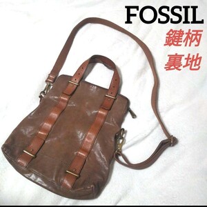 裏地鍵柄 FOSSIL フォッシル レザーショルダーバッグ サコッシュ ハンドバッグ 2way ブラウン 斜め掛けバッグ メンズ レディース 総柄 派手