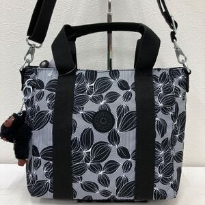 □48−2788 美品 kipling キプリング レディース 2way ショルダーバッグ ハンドバッグ チャーム付き 黒 ブラック 花柄 総柄 シンプル 軽量