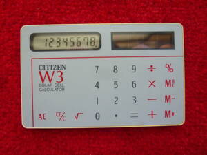 ソーラー電卓　シチズン製　W３　昭和59年頃発売され、当時は斬新でよく売れました。動作確認済み　未使用品　透明カバー付き