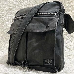 ポーター PORTER スモーキー メンズ ビジネス ショルダーバッグ ボディバッグ サコッシュ 斜め掛け 多収納 ブラック系 黒 鞄 吉田カバン