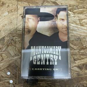 シPOPS,ROCK MONTGOMERY GENTRY - CARRYING ON アルバム TAPE 中古品