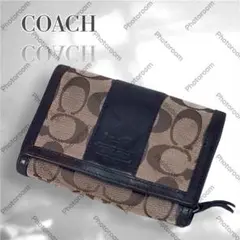 COACH コーチ　二つ折り財布　小銭入れ　シグネチャー　茶色　ロゴ