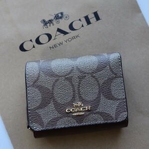 【新品】coach コーチ 三つ折り財布 カーキ　サドル