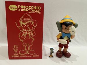 KAWS OriginalFake Pinocchio & Jiminy Cricket