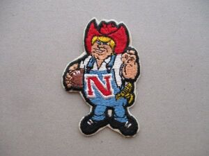 80s ネブラスカ大学 ワッペンHerbie Huskerキャラ/Nebraskaリンカーン校パッチpatchアメフトNCAAフットボールUSA米国アメリカFOOTBALL V198