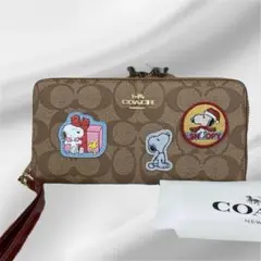 新品⭐︎ コーチ COACH スヌーピー　コラボ　ワッペン　長財布　シグネチャー