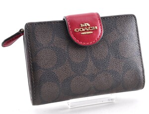 美品 COACH コーチ シグネチャー 二つ折り財布 PVC レザー 革 ブラウン 茶色 レッド 赤 総柄 柄あり レディース 女性 3A1217