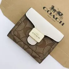 COACHコーチ折りたたみ財布　レディースのブラウン色新品財布　おすすめ