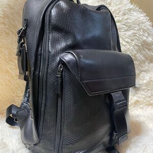 TUMI トゥミ リュック バックパック ビジネスバッグ アストン ASHTON 黒 ブラック オールレザー 本革 編み込み 大容量 A4可 PC メンズ