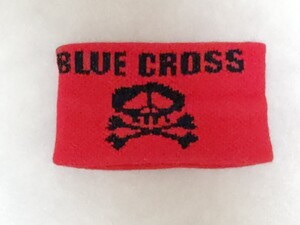 美品【ブルークロス　BLUE CROSS】リストバンド 　赤に黒字にBLUE CROSSのロゴ