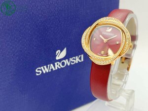 2407605292　△1円～！SWAROVSKI スワロフスキー 腕時計 赤系文字盤 2針 クリスタルフラワー クオーツ 付属品付 レディース 中古