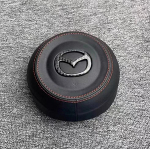 送料無料マツダ　CX-3 CX-5 CX-8 CX-30 アテンザ　アクセラ　レザー製 ステアリングエアバッグカバー　1個　レッドステッチ