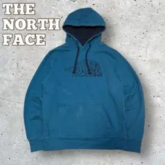 139 USA規格　THE NORTH FACE かすれロゴプリントパーカー 青